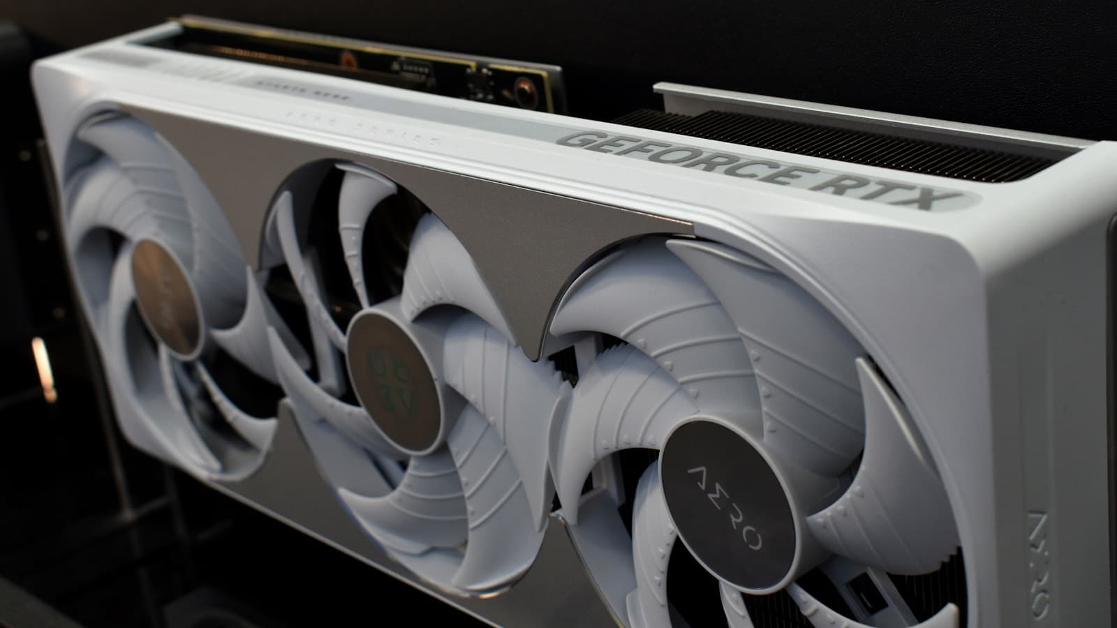 White RTX graphics card with three fans, representing fake RTX 4090 scam detection